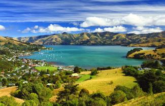 French Akaroa sitting pretty surrounded by water.