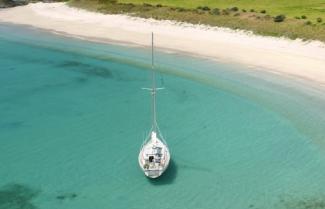 Boat sitting in the Bay of Islands on a calm sunny day.